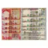 25000 Iraqi Dinar note featuring Kurdish peasant and Hammurabi 50000 IQD banknote with Euphrates river and ancient fishing scene Lot of uncirculated Iraqi Dinar polymer notes Security features on new Iraq currency